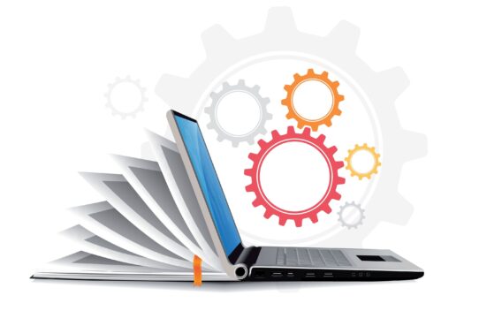 Notebook turning into a laptop with machine clogs in the background